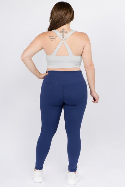 Women's Plus Size Active Buttery Soft Capri Leggings. • Wide, high rise  waistband lies flat against your skin • Ultra buttery soft fabrication •  Interior waistband pocket can hold keys, cards, cash •